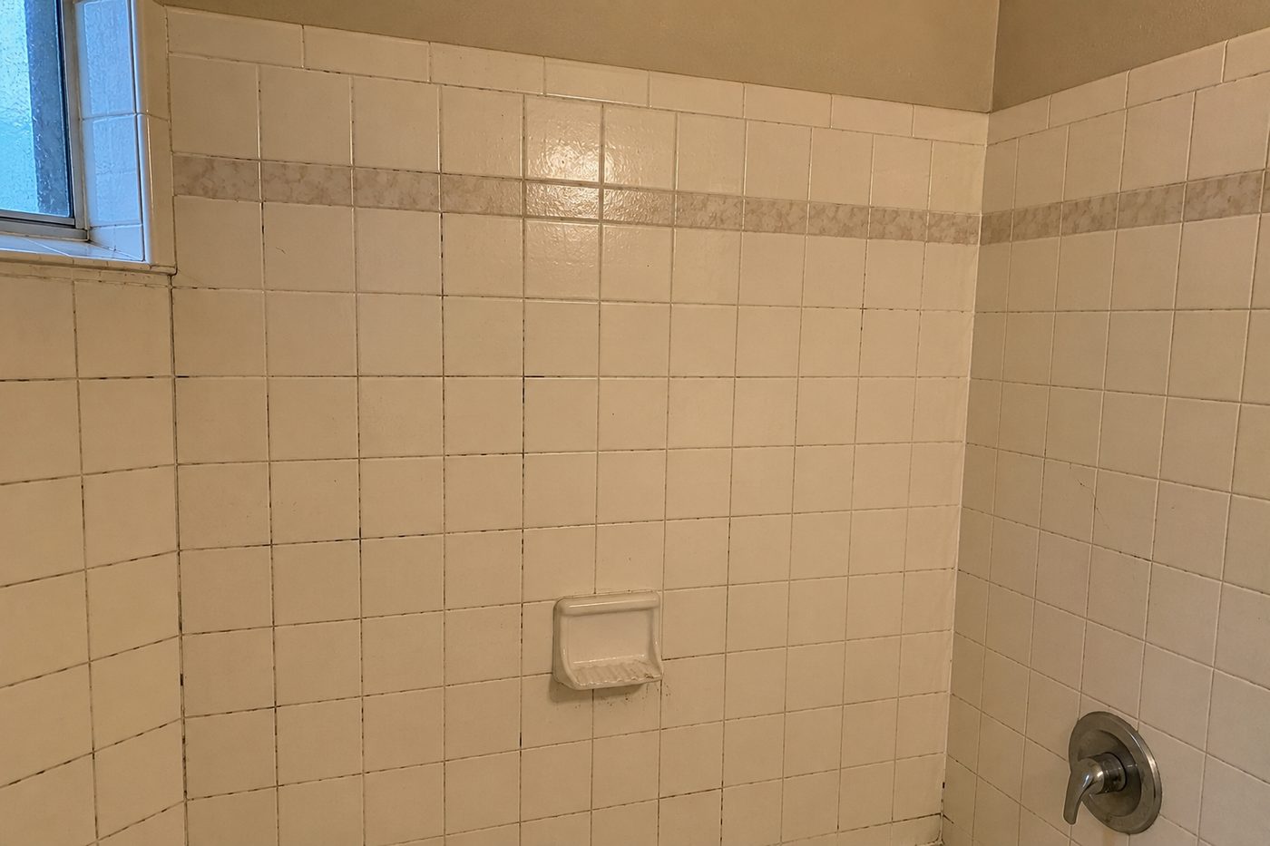 Shower tile restoration — before